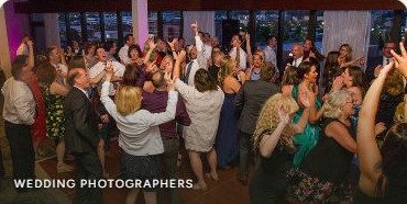 Guests dancing at a reception, Complete Weddings + Events